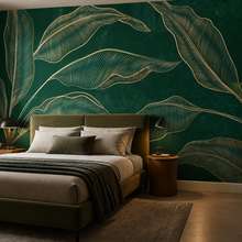 Grossformatige-komposition-goldener-blatter-vor-dunklem-hintergrund-fototapete-fur-schlafzimmer-fototapeten-demural